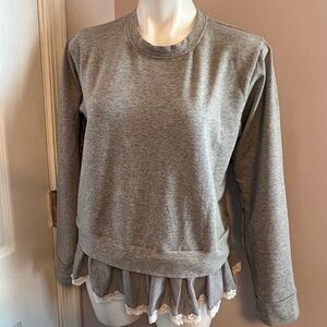 Alya gray sweatshirt with feminine trim
